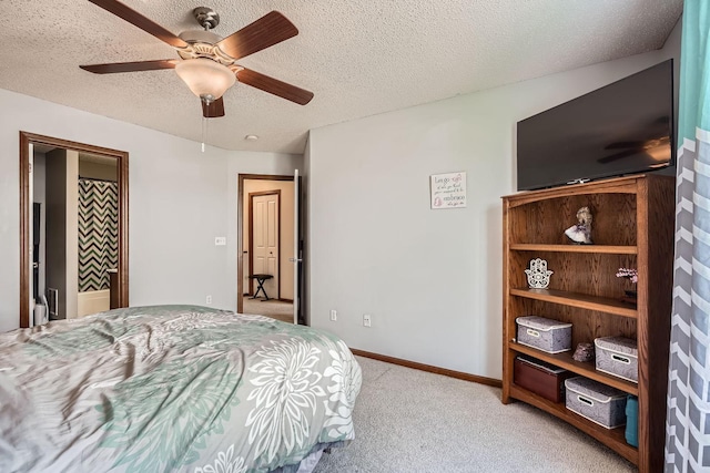 7754 Lachman Ave NE, Otsego, MN 55301 - bedroom featuring a textured ceiling, light carpet, ceiling fan, and baseboards