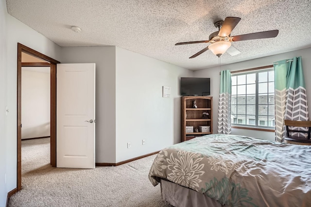 7754 Lachman Ave NE, Otsego, MN 55301 - bedroom featuring carpet, a textured ceiling, baseboards, and a ceiling fan