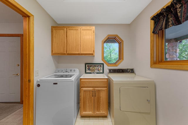 6031 232nd St W, Faribault, MN 55021 - laundry area with cabinet space, washing machine and dryer, and plenty of natural light