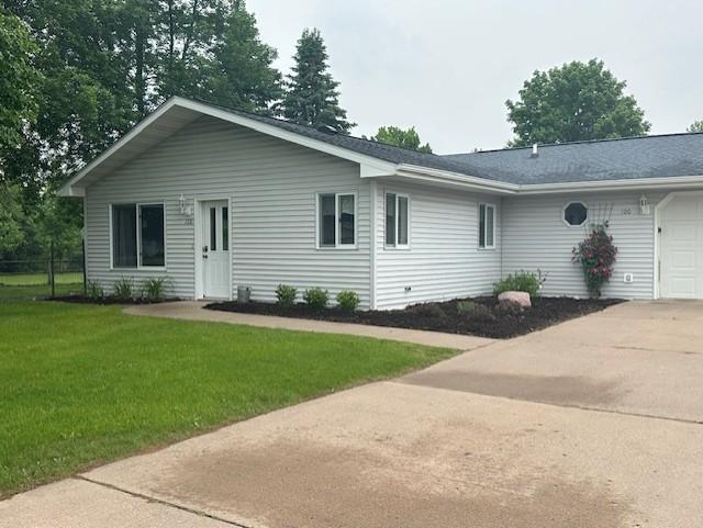 100 Maple Cir, Grantsburg, WI 54840 - single story home featuring driveway, a garage, and a front lawn