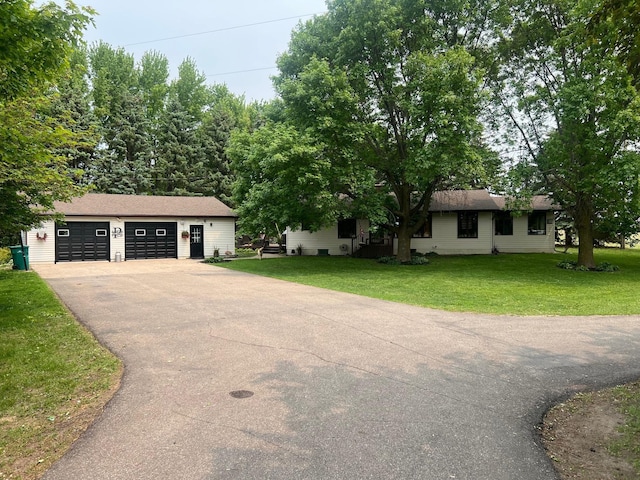 20906 624th Ave, Litchfield, MN 55355 - view of front of property featuring driveway, a front lawn, and an outdoor structure