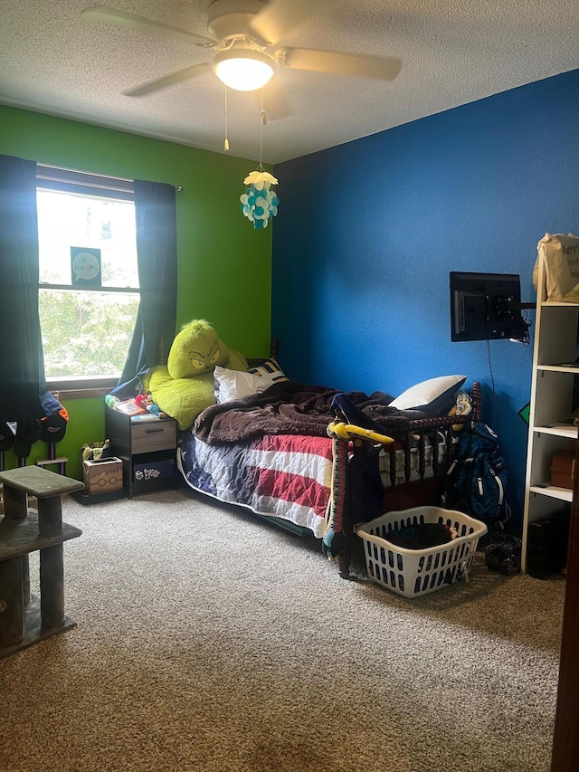20906 624th Ave, Litchfield, MN 55355 - carpeted bedroom featuring a textured ceiling and a ceiling fan