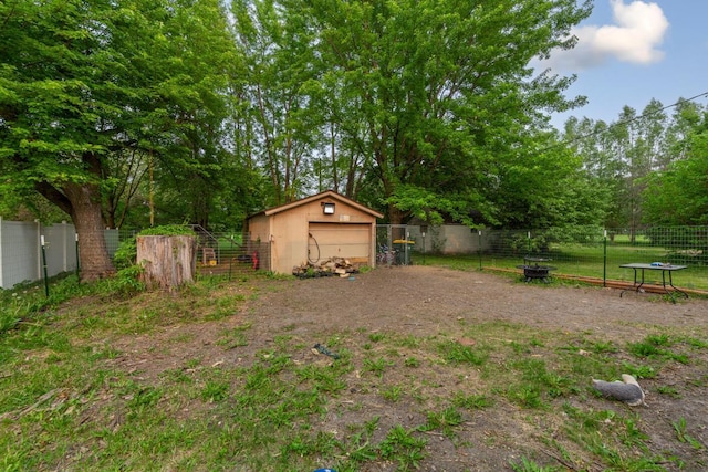 86 Somerville St S, Morgan, MN 56266 - fenced yard with a garage and an outdoor structure