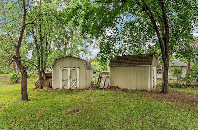 6379 Hodgson Rd, Lino Lakes, MN 55014 - view of green lawn with a storage unit