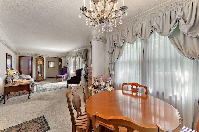 6379 Hodgson Rd, Lino Lakes, MN 55014 - carpeted dining space featuring a textured ceiling and a chandelier