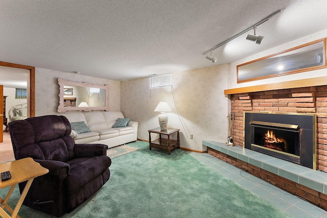 6379 Hodgson Rd, Lino Lakes, MN 55014 - carpeted living area with track lighting, a brick fireplace, a textured ceiling, and wallpapered walls