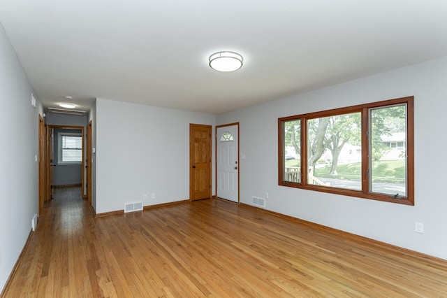 3568 6th St NW, Rochester, MN 55901 - empty room featuring light wood finished floors and baseboards