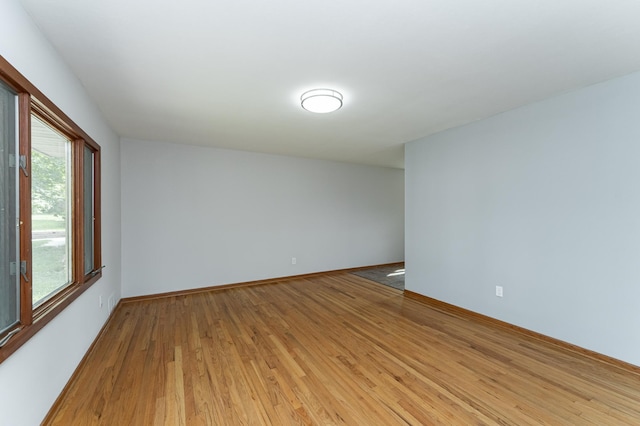 3568 6th St NW, Rochester, MN 55901 - unfurnished room featuring light wood-style floors and baseboards