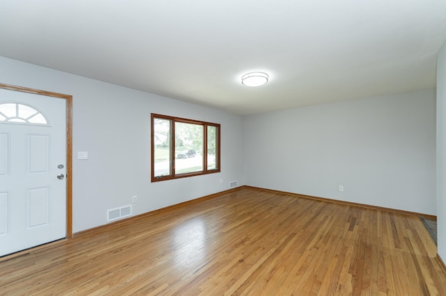 3568 6th St NW, Rochester, MN 55901 - foyer featuring light wood-style flooring and baseboards
