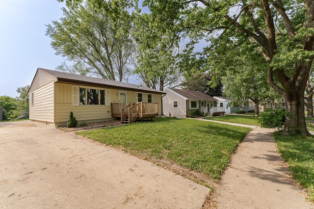 3568 6th St NW, Rochester, MN 55901 - ranch-style home with a front lawn and board and batten siding