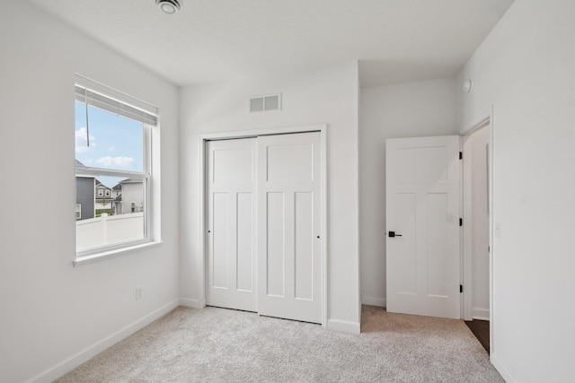 5173 Useppa Trl, Woodbury, MN 55129 - unfurnished bedroom with carpet and a closet