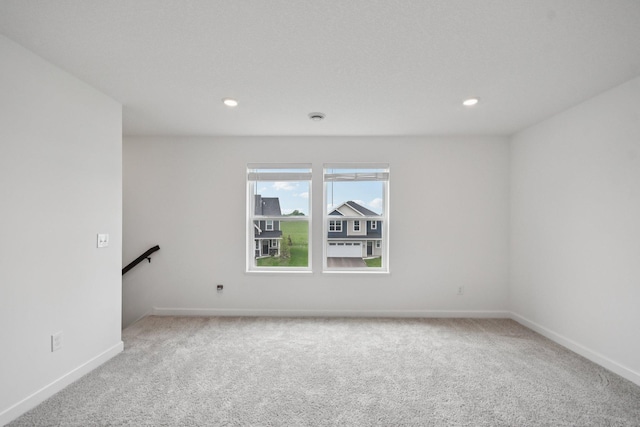5173 Useppa Trl, Woodbury, MN 55129 - spare room featuring carpet and recessed lighting