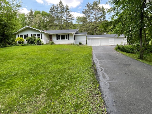 731 Woodland Loop, Fergus Falls, MN 56537 - ranch-style home featuring asphalt driveway and a front lawn