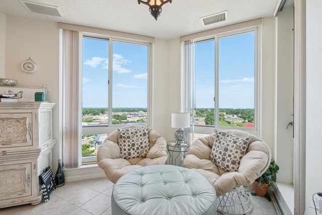 6600 Lyndale Ave S Unit 1005, Richfield, MN 55423 - living area featuring light tile patterned flooring and a textured ceiling