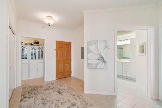 6600 Lyndale Ave S Unit 1005, Richfield, MN 55423 - foyer featuring electric panel, crown molding, light tile patterned floors, and baseboards