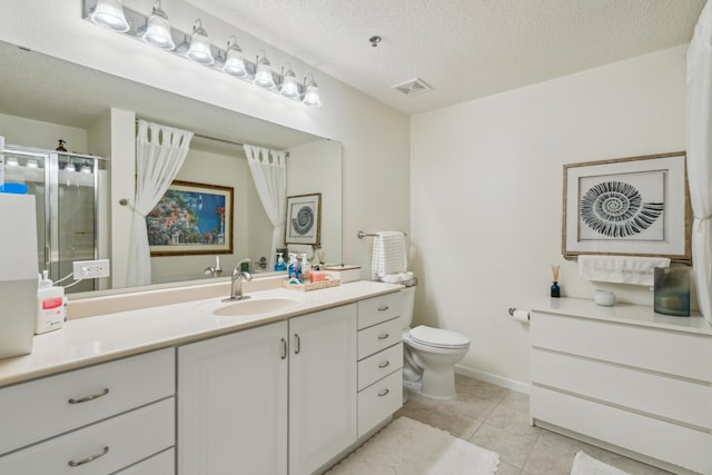 6600 Lyndale Ave S Unit 1005, Richfield, MN 55423 - full bath featuring vanity, a stall shower, toilet, tile patterned floors, and a textured ceiling