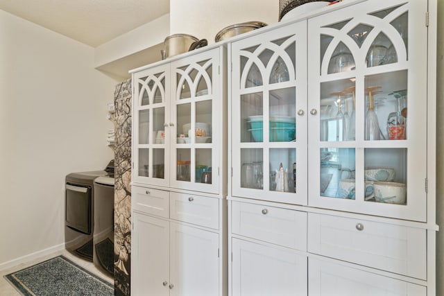 6600 Lyndale Ave S Unit 1005, Richfield, MN 55423 - detailed view of washing machine and clothes dryer and baseboards
