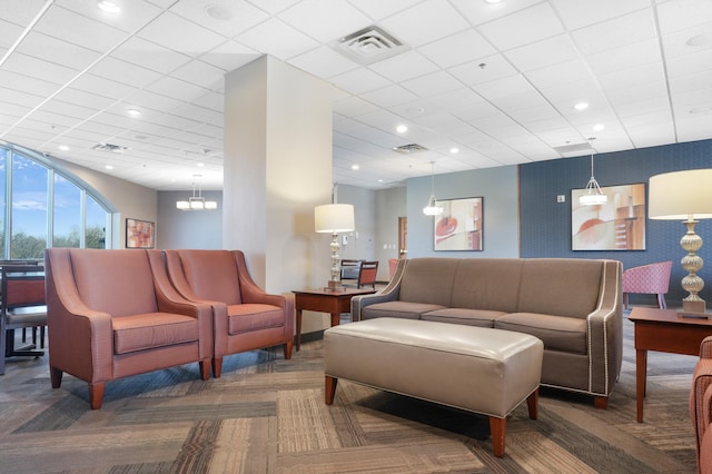 6600 Lyndale Ave S Unit 1005, Richfield, MN 55423 - carpeted living area featuring a paneled ceiling