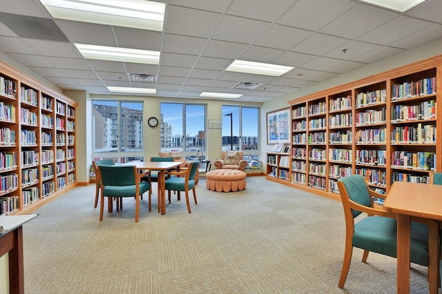 6600 Lyndale Ave S Unit 1005, Richfield, MN 55423 - carpeted office space featuring bookshelves, a drop ceiling, and a city view