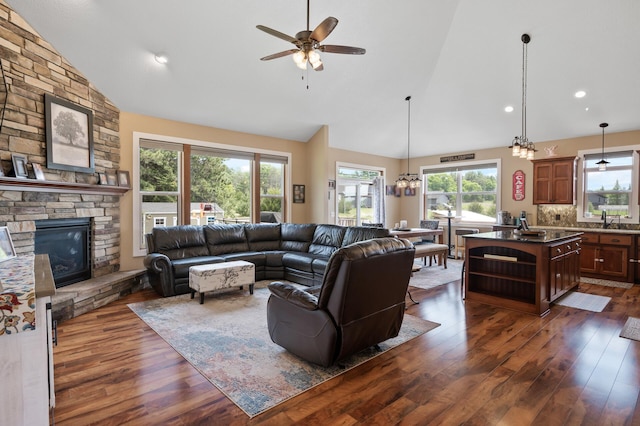 25455 145th St NW, Zimmerman, MN 55398 - living room featuring dark wood-type flooring, a ceiling fan, plenty of natural light, high vaulted ceiling, and recessed lighting