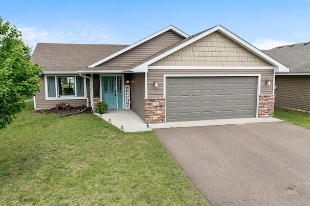 783 Park Brook Rd NW, Isanti, MN 55040 - view of front of home featuring stone siding, driveway, a garage, a front lawn, and roof with shingles