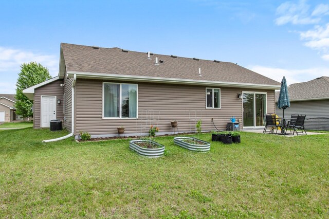 783 Park Brook Rd NW, Isanti, MN 55040 - rear view of property with central AC unit, a lawn, a patio, and a shingled roof
