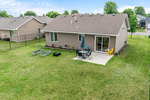 783 Park Brook Rd NW, Isanti, MN 55040 - back of house with a patio area and roof with shingles