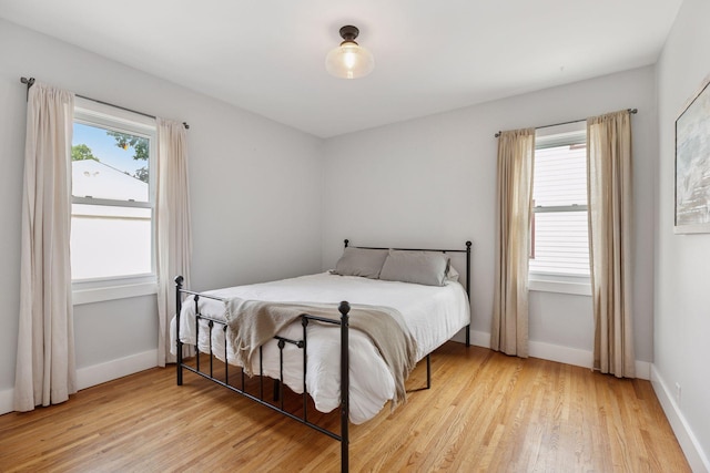 7417 Colfax Ave S, Richfield, MN 55423 - bedroom with light wood-style floors and baseboards