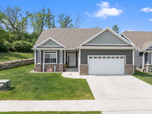 1884 Alexander Rd NE, Rochester, MN 55906 - craftsman house with an attached garage, driveway, stone siding, a front yard, and roof with shingles
