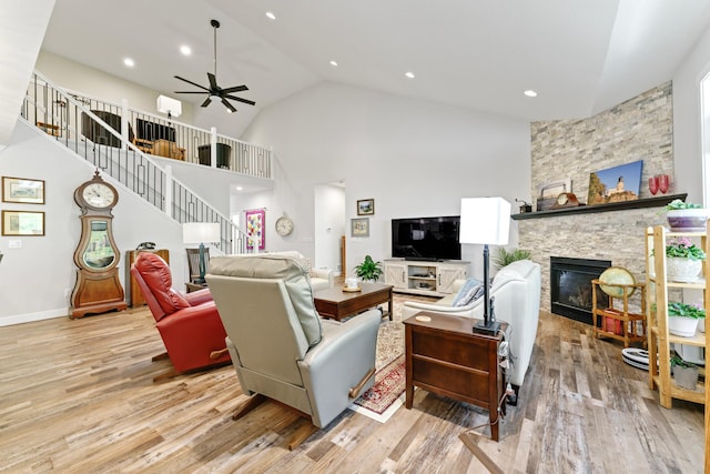 1884 Alexander Rd NE, Rochester, MN 55906 - living area featuring stairway, wood finished floors, ceiling fan, high vaulted ceiling, and recessed lighting
