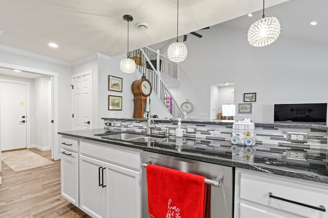 1884 Alexander Rd NE, Rochester, MN 55906 - kitchen with stainless steel dishwasher, a chandelier, a sink, ornamental molding, and light wood-type flooring