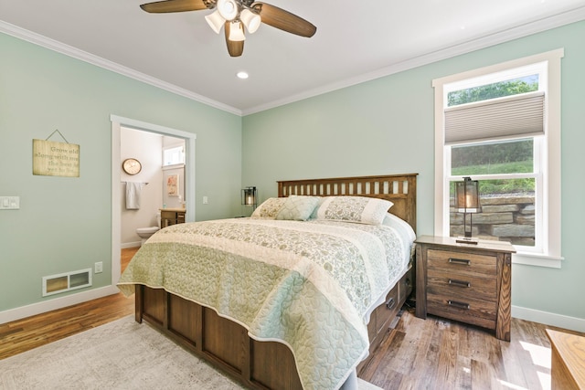 1884 Alexander Rd NE, Rochester, MN 55906 - bedroom with wood finished floors, crown molding, baseboards, ensuite bathroom, and a ceiling fan