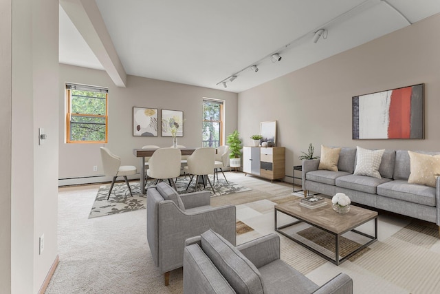 546 Laurel Ave Unit 6, Saint Paul, MN 55102 - living room featuring light colored carpet and a baseboard heating unit