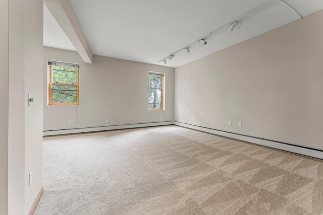 546 Laurel Ave Unit 6, Saint Paul, MN 55102 - carpeted spare room with a baseboard heating unit and baseboards