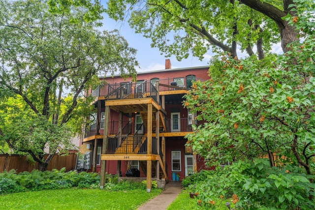 546 Laurel Ave Unit 6, Saint Paul, MN 55102 - back of house featuring a chimney