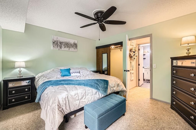 2060 Pathways Dr Unit 13, Saint Paul, MN 55119 - bedroom featuring carpet flooring, a textured ceiling, ensuite bathroom, a ceiling fan, and a spacious closet