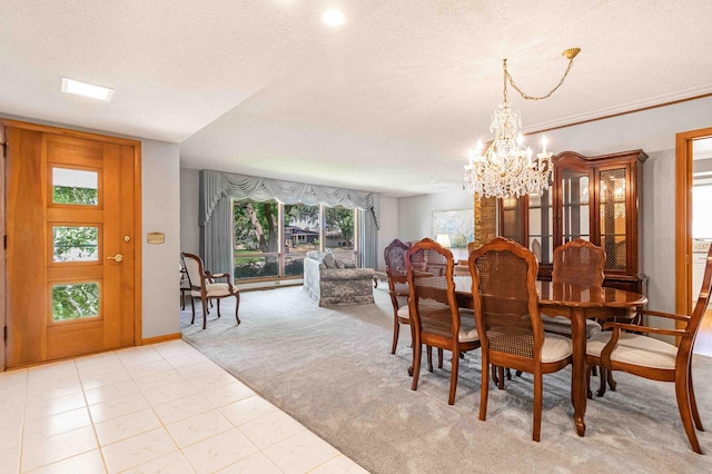 5313 Birchcrest Dr, Edina, MN 55436 - dining space with a chandelier, light carpet, a textured ceiling, baseboards, and light tile patterned flooring