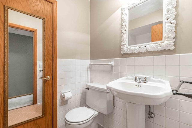 5313 Birchcrest Dr, Edina, MN 55436 - half bath with toilet, a wainscoted wall, and tile walls