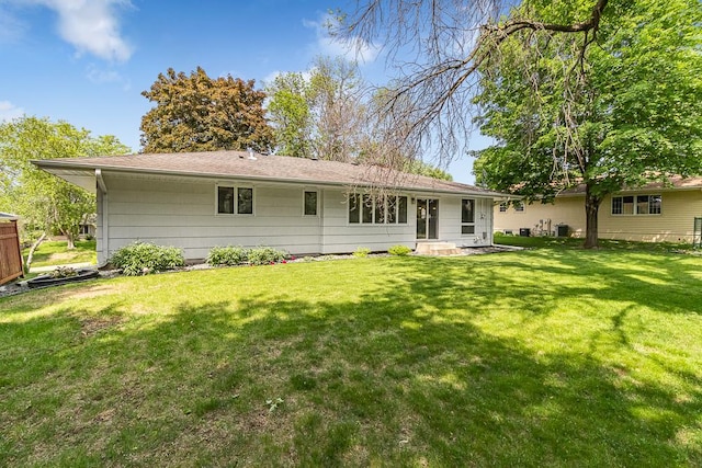 5313 Birchcrest Dr, Edina, MN 55436 - rear view of house featuring a yard