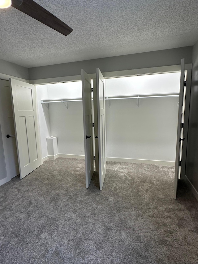 1911 Johnson St, Albert Lea, MN 56007 - unfurnished bedroom with carpet floors, a textured ceiling, and ceiling fan