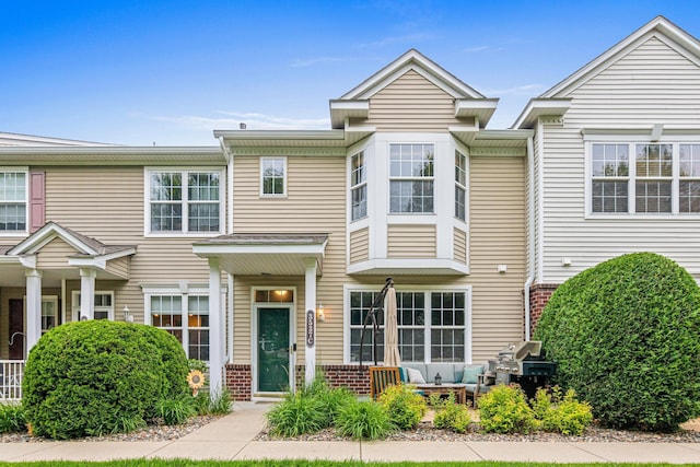 3537 Cherry Ln Unit C, Woodbury, MN 55129 - view of property featuring brick siding