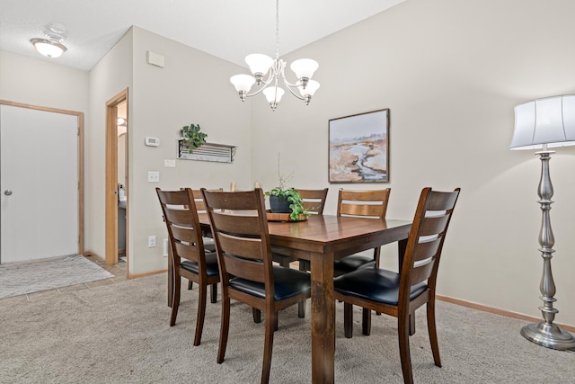 3537 Cherry Ln Unit C, Woodbury, MN 55129 - dining area featuring light colored carpet and a chandelier