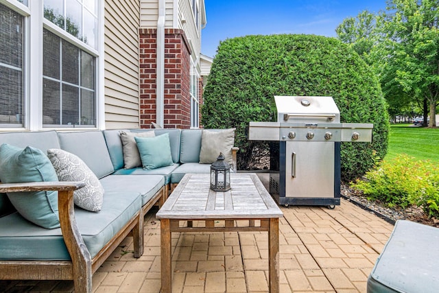 3537 Cherry Ln Unit C, Woodbury, MN 55129 - view of patio featuring a grill and an outdoor living space