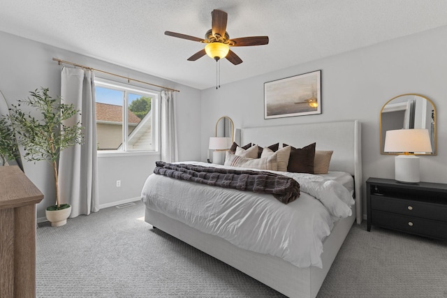 104 Bison Ct, Buffalo, MN 55313 - bedroom with carpet, a ceiling fan, and a textured ceiling