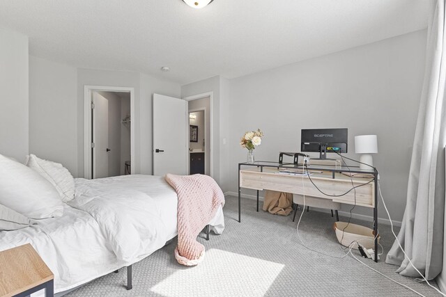 104 Bison Ct, Buffalo, MN 55313 - bedroom featuring carpet, an office area, and a walk in closet