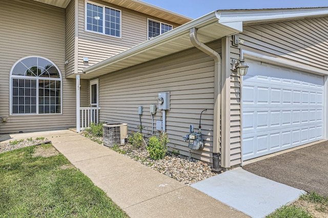 1127 Ridgestone Pl, Buffalo, MN 55313 - view of home's exterior with a garage and asphalt driveway