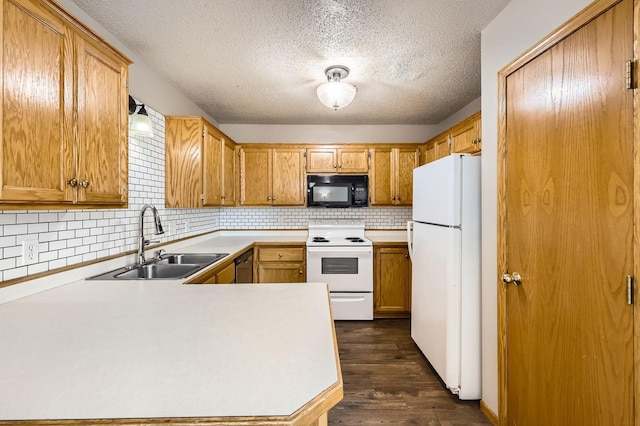 1127 Ridgestone Pl, Buffalo, MN 55313 - kitchen with white appliances, a textured ceiling, light countertops, decorative backsplash, and dark wood-style floors