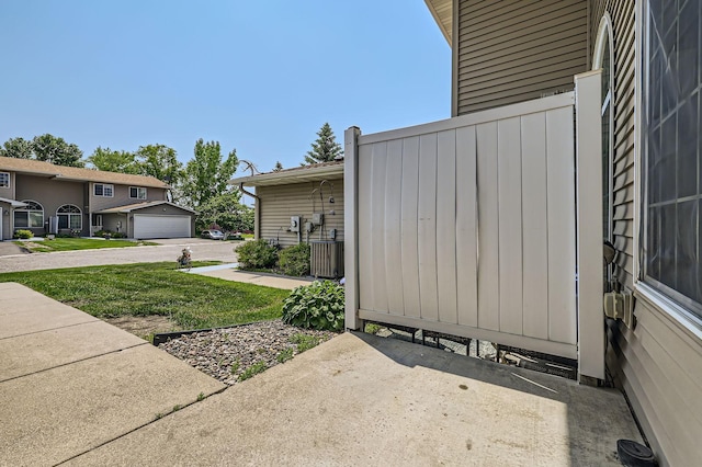 1127 Ridgestone Pl, Buffalo, MN 55313 - view of property exterior with a garage and a yard