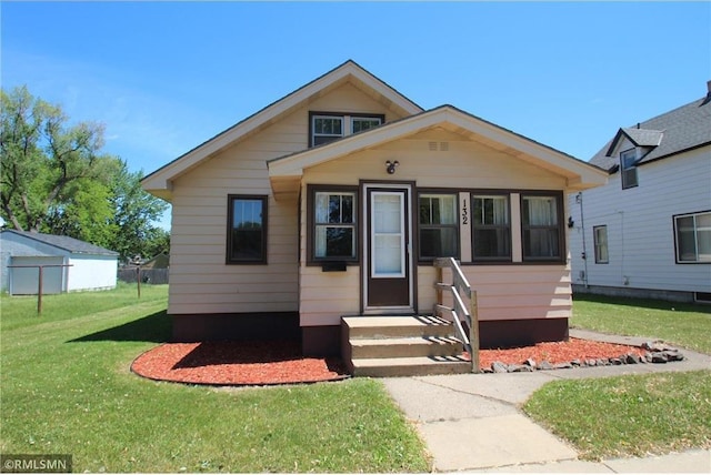 132 4th Ave N, Waite Park, MN 56387 - bungalow with a front yard