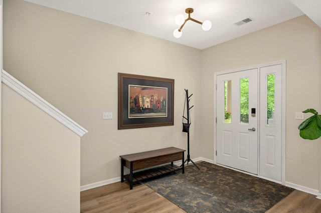 11275 Preswick Blvd, Eden Prairie, MN 55344 - entrance foyer featuring wood finished floors and baseboards